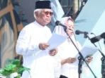 gus-mus-membacakan-piagam-hasil-muktamar-fiqih-peradaban-suwinto_1675741511